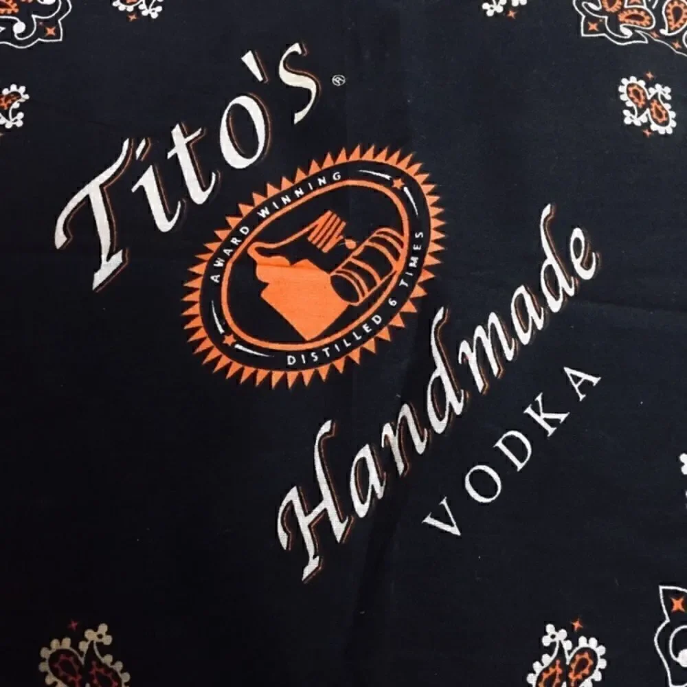 New Tito’s scarf black white orange festival wear